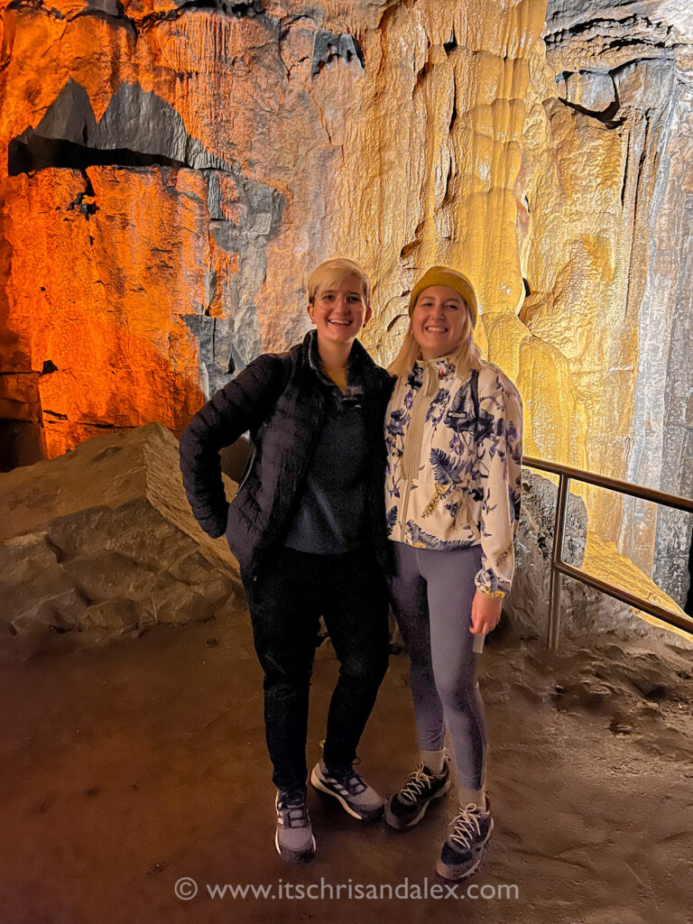 Alex and Chris standing in front of Butterscotch Falls in Mammoth Cave National Park